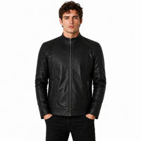 Man wearing a black leather jacket on a white background
