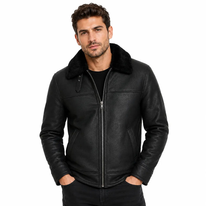 Man wearing a black leather jacket with fur collar on a white background