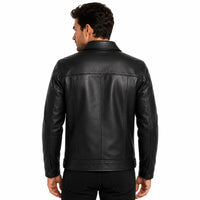 Man wearing a black leather jacket on a white background