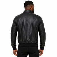 Man wearing a Men's Leather Bomber Jacket, Zip Front, Multiple Pockets | Black The Stitch Fit